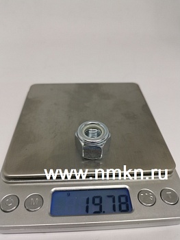 Гайка м12*1,25 с белым нейлоновым кольцом DIN 982 Гайка м12*1,25 с белым нейлоновым кольцом DIN 982